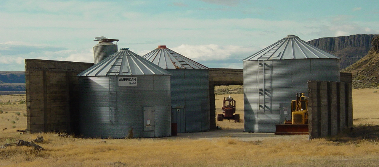 Old silos and tractors in the middle of nowhere
