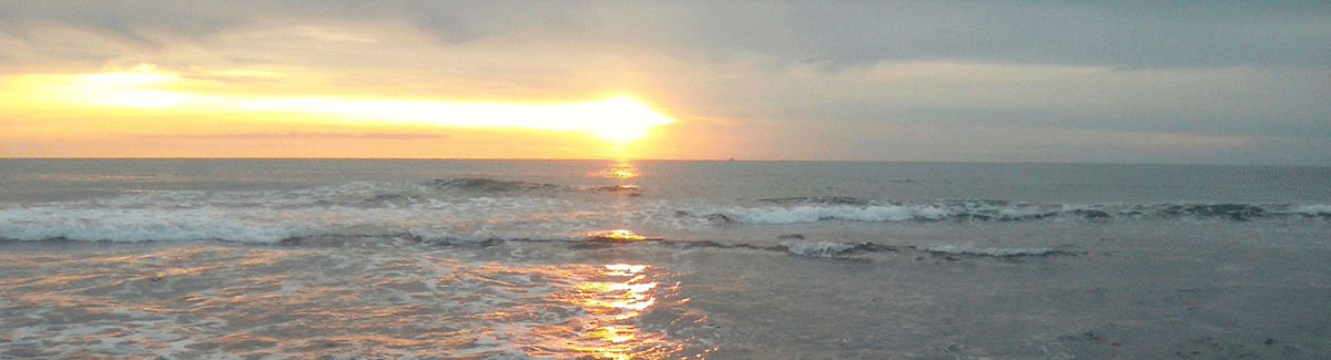 A beach sunset in Puerto Colombia.