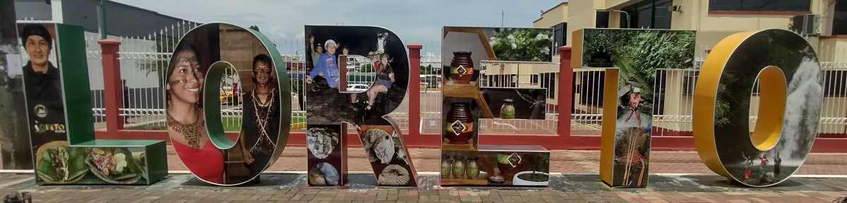 loreto-sign.jpg The Loreto city name sign is on the main road through town, located at about the center of town, near the one statue in the middle of the road.