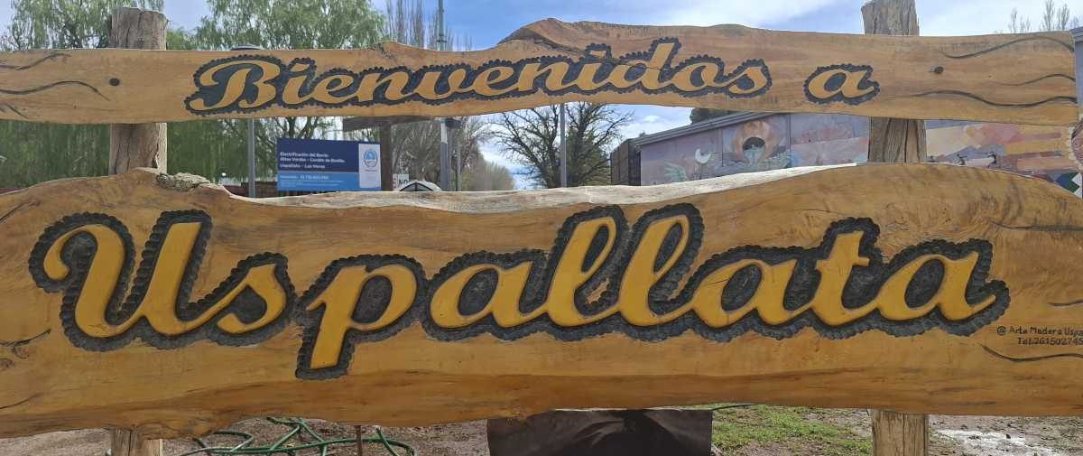 City name sign in the main intersection, there is another bigger sign outside of town near the bridge