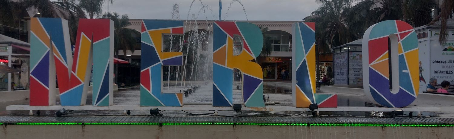 Villa de Merlo sign on the main tourist road midway up the road.
