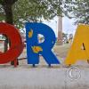 City name sign in Plaza Presidente Peron