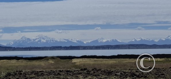 Lake Titicaca and snow capped mountains (2)