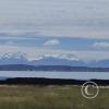 Lake Titicaca and snow capped mountains