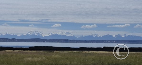 Lake Titicaca and snow capped mountains