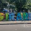 City name letters across from the bus terminal on Calle 25