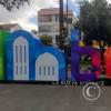 Ambato city name sign in Parque Cevallos at Calle Joaquin Latama and Sucre