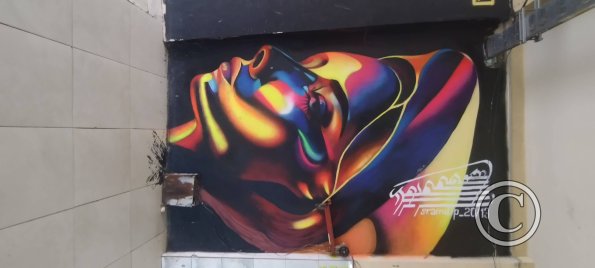 Mural on Av Doce de Noviembre near Marieta de Vientimilla