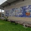 Mural on side of bus terminal on Av 6 de Diciembre at Rio Huataraco