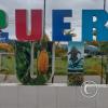 Puerto Quite city name sign, east entrance on Ruta E28