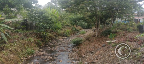 Creek at Luis Molina Celi and Segundo Santana