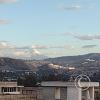 View from hostel roof at Av Equinoccial and Sheygua looking toward Quito