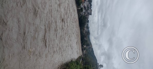 River view from the malecon near 24 de Mayo