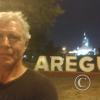 Me in front of the city name sign