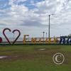 city name sign at the costanera near Super Seis