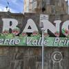City name sign in Plaza Micaela Bastidas at Av Elias near Pasaje Carmelitas