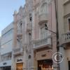 Calle Mercaderes near Plaza de Armas, building built in 1929
