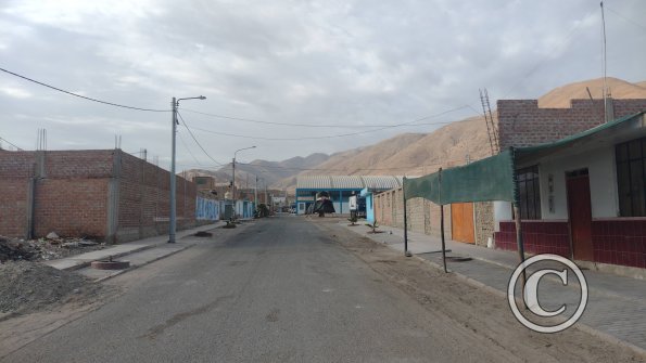 Looking toward town from the beach, unnamed road