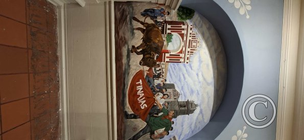 Painting a mural inside Las Tinajas restaurant (2)