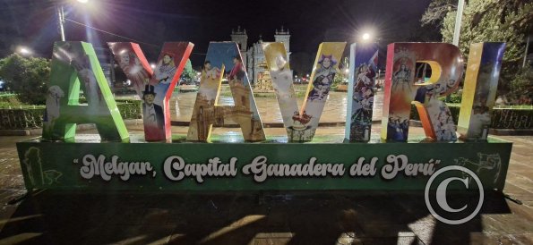 City name sign in the Plaza de Armas at night (2)