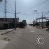 Av. 9 de Noviembre from the unnamed road alongside the stadium