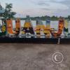 Juanjui sign at end of Jiron Mariscal Castilla next to the river