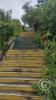 Stairs from Av. Circunvalacion going up hill to unnamed streets