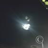Moon behind clouds