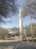 A tower inside a closed area behind Primax gas station