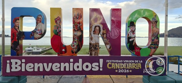City name sign at the pier at Jiron Luis Banchero Rossi