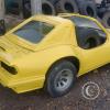 A yellow kit car