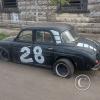An old car that appears to be rear-engine