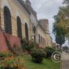 The building is the Police and Jail, built in 1891 at Calle 18 de Mayo y Av. Coronel Carlos Lecueder