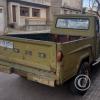 Old pickup, tailgate says Ford (2)