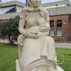 Stature of mother and baby at bus terminal