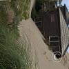 Sand dune swallowing a house (2)