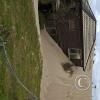 Sand dune swallowing a house