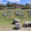 City name in rocks at Route 9 and Av Herrera