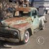 Old International pickup at Calle Belen y Calle Julio Delgado