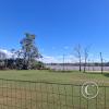 Soccer field alongside the river