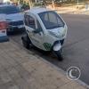 A tiny 3-wheel car thing